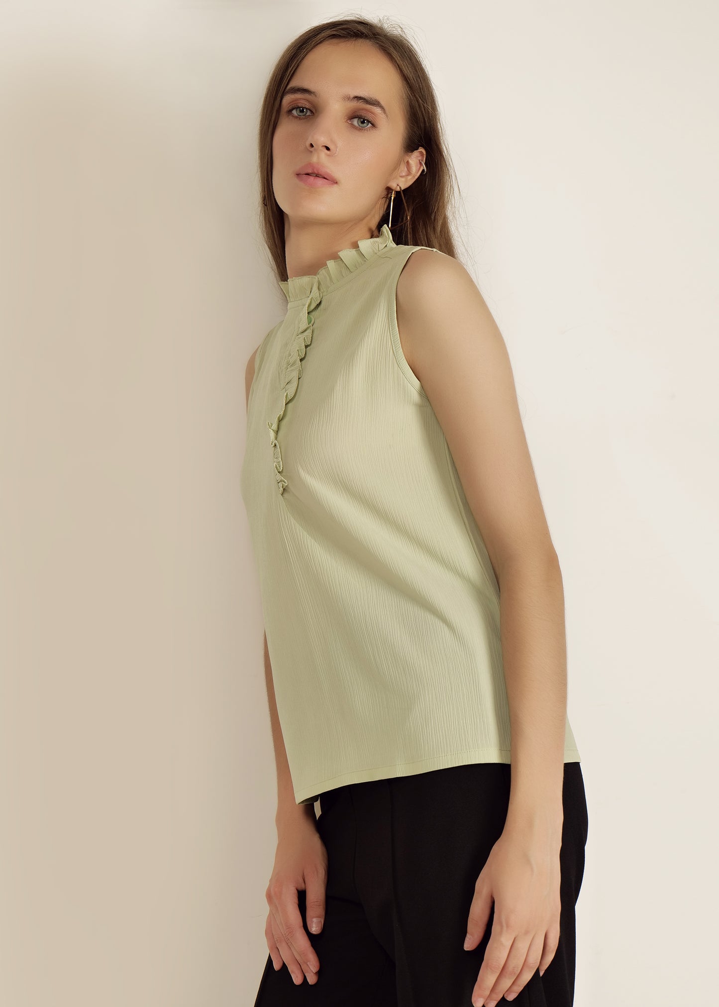 Saava Pista Green Buttoned Sleeveless Top